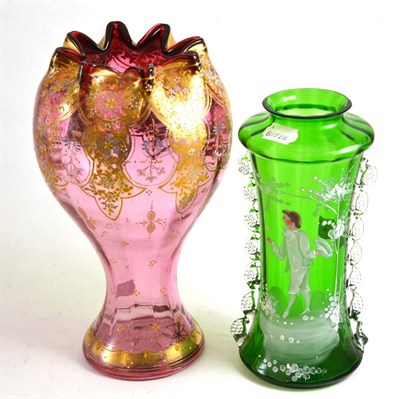 Lot 46 - Victorian gilt decorated cranberry vase and a Mary Gregory green glass vase (2)