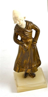 Lot 47 - Art Deco bronze and ivory figure of a Dutch girl, circa 1920