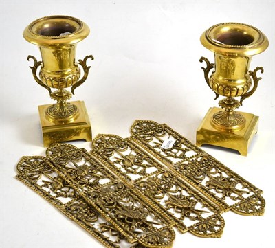 Lot 63 - A pair of brass urn shaped vases and four French style brass door finger plates (4)