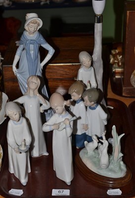 Lot 67 - Three Lladro figures, three Nao figures and a Nao lamp