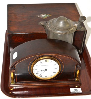 Lot 85 - An Edwardian inlaid mahogany mantel timepiece, a rosewood workbox and a Belgian pewter jug (3)