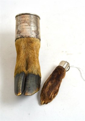 Lot 100 - Stirrup cup in the form of a deer's foot with engraved mount dated 1903 and a pendant with...