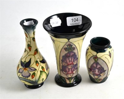 Lot 104 - Two modern Moorcroft 'Foxglove' vases designed by Rachel Bishop and another 'Sweet Thief'...