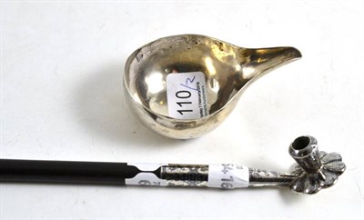 Lot 110 - An unmarked metalware pap boat and an unmarked metalware pipe with niello decoration