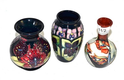 Lot 112 - Three modern Moorcroft vases - Red Tulip, Violet and a training piece by Victoria Ford (brown...