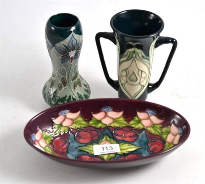 Lot 113 - Three pieces of Moorcroft - Cherry, Snowdrop and a trial piece