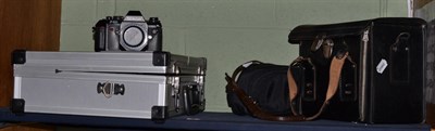 Lot 144 - Nikon F301 and Nikkormat and Kodak folding camera, together with various lenses and accessories