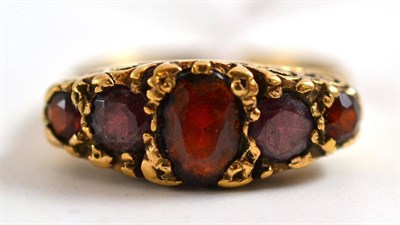 Lot 176 - 9ct gold and garnet five stone ring