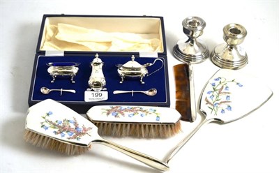 Lot 199 - Silverwares including cased condiment set, pair of dwarf candlesticks and an enamelled dressing...