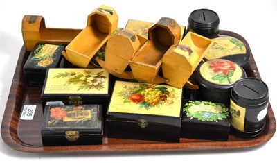 Lot 205 - Five Mauchline ware miniature cradles and fourteen pieces of ebonised souvenir ware with...