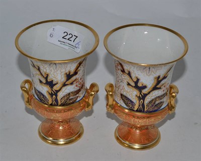 Lot 227 - A pair of early 19th century Coalport porcelain campana shaped vases