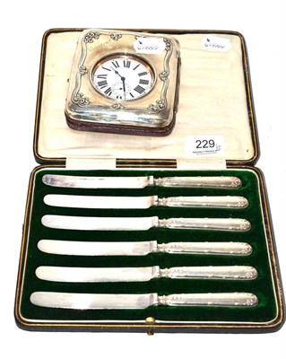 Lot 229 - Six silver handled knives and a silver case with pocket watch