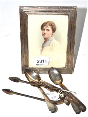 Lot 231 - Silver engine turned photograph frame and a set of six silver spoons and tongs