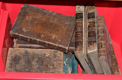 Lot 237 - A collection of early leather bound books including medicine, Dickens etc
