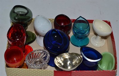 Lot 251 - A collection of twelve assorted eye baths including blue, red and green glass