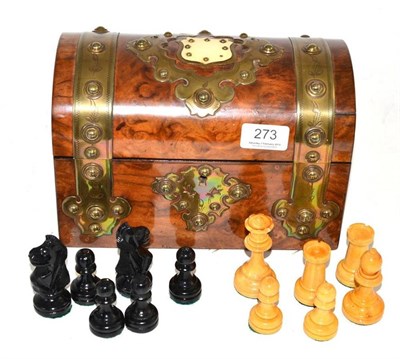 Lot 273 - A Victorian burr walnut and brass bound tea caddy containing assorted chess pieces