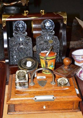 Lot 288 - An ink stand, two glass decanters, coins, a fox head on plaque, etc