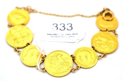 Lot 333 - A sovereign bracelet; three full sovereigns and four half sovereigns