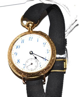 Lot 335 - A lady's fob watch converted to wristwatch, case stamped '18K'