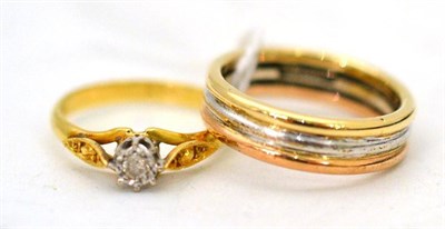 Lot 346 - A 9ct three colour gold band ring and a diamond solitaire ring (2)