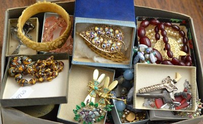 Lot 378 - A box of assorted costume jewellery including beads, paste jewellery, silver shields, etc
