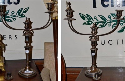 Lot 387 - A pair of Old Sheffield plate three branch candelabra