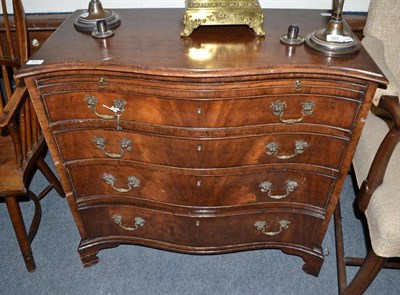 Lot 652 - 18th century style walnut serpentine front bachelor's chest