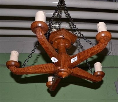 Lot 654 - A Yorkshire School oak chandelier