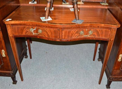 Lot 656 - Georgian mahogany serpentine table