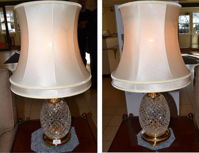 Lot 660 - A pair of Waterford crystal pineapple form table lamps