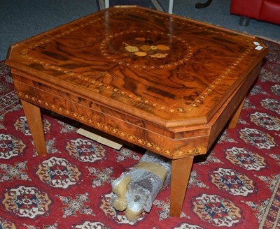 Lot 704 - An Italian games table with playing cards, dice etc