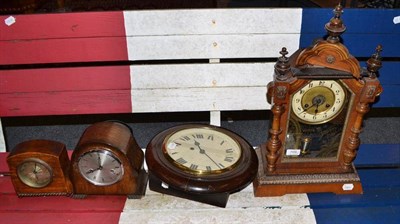 Lot 709 - A striking alarm mantel clock, Junghans, two mantel clocks and a wall timepiece