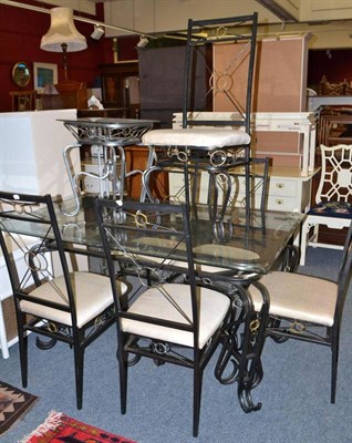 Lot 742 - A modern glass topped dining table, six chairs and a coffee table