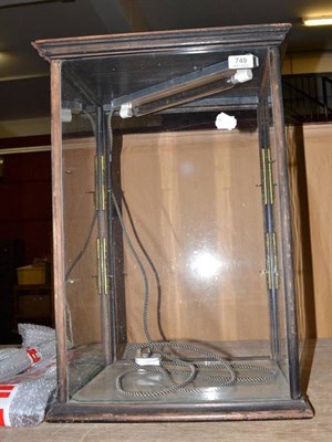 Lot 749 - A table top display cabinet with two glass shelves