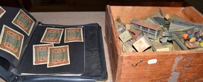 Lot 760 - Pine box containing early 20th century Japanese figures and buildings and a folio of banknotes,...