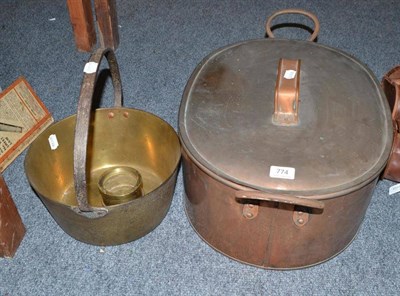 Lot 774 - Copper oval fish kettle, jam pan and a brass hub cap