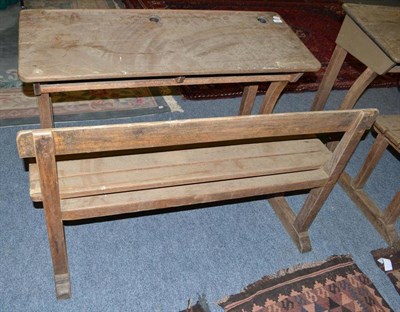 Lot 784 - An oak double seated child's desk