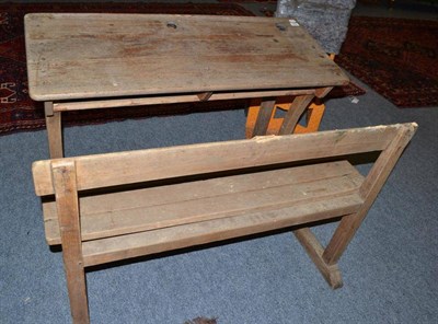 Lot 785 - An oak double seated child's desk