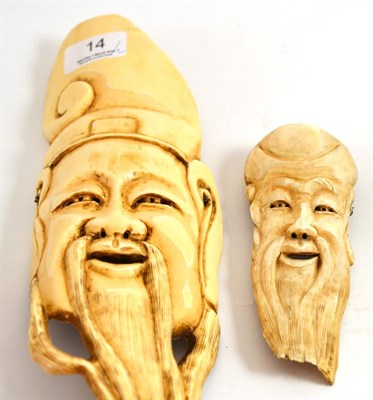 Lot 14 - Two early 20th century Chinese ivory mask carvings
