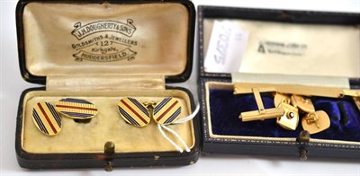 Lot 23 - Two pairs of cufflinks, 9ct gold and stamped '750', another pair of cufflinks and a tie clip