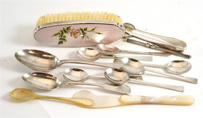 Lot 25 - A collection of silver spoons, sugar tongs, swizzle stick, mother-of-pearl knife and spoon, etc