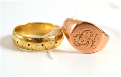Lot 33 - A 9ct gold band ring and a 9ct gold rose gold signet ring