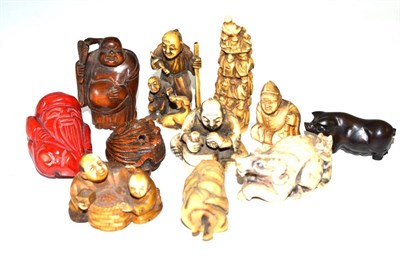 Lot 35 - A collection of carved ivory, resin, wood and hardstone netsuke and carvings, circa 1920