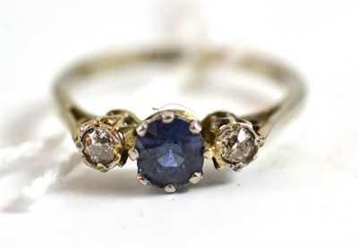 Lot 36 - Three stone sapphire and diamond ring