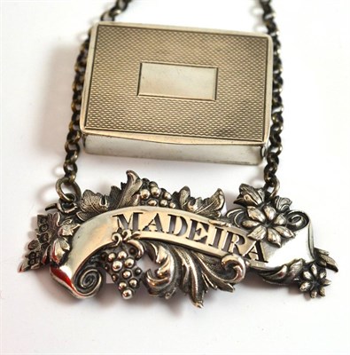 Lot 37 - A silver snuff box and a 'Madeira' wine label
