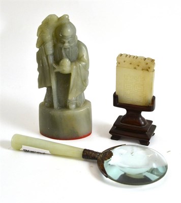 Lot 38 - A Chinese carved soapstone seal, a carved hardstone plaque and a magnifying glass