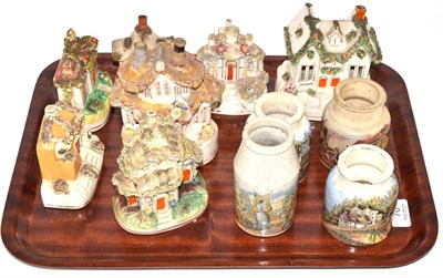 Lot 76 - A collection of Staffordshire cottages and Pratt type transfer decorated bottles