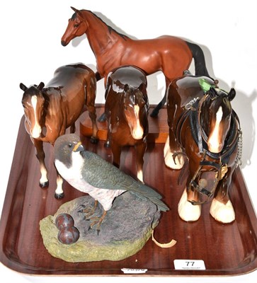 Lot 77 - Beswick horses including a harnessed shire, three other brown models and figure of a falcon (5)