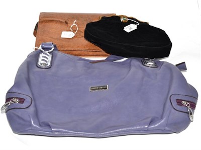 Lot 87 - Black velvet evening bag with gilt metal hinged clasp, lizard clutch bag and a modern purple...