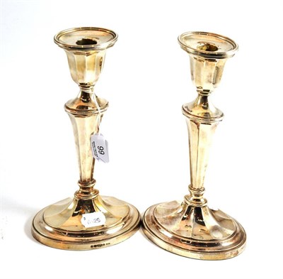 Lot 99 - A pair of modern silver candlesticks in Neo Classical style